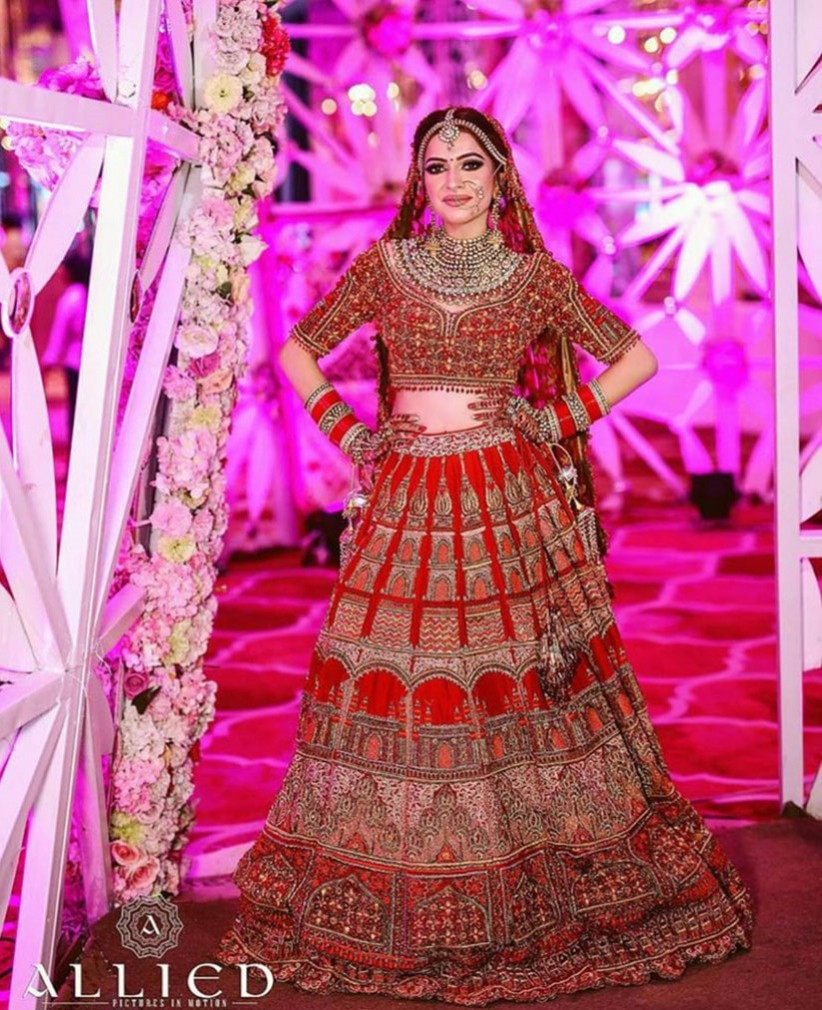 bridal lehenga in red and golden colour