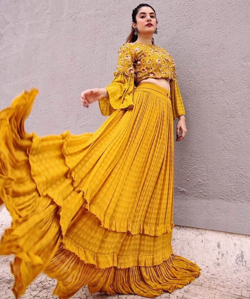 35 Trendy Haldi Outfit Ideas For The Bride Haldi Ceremony Dresses Styling Tips Ceremony Dresses Designer Party Wear Dresses Mehendi Outfits