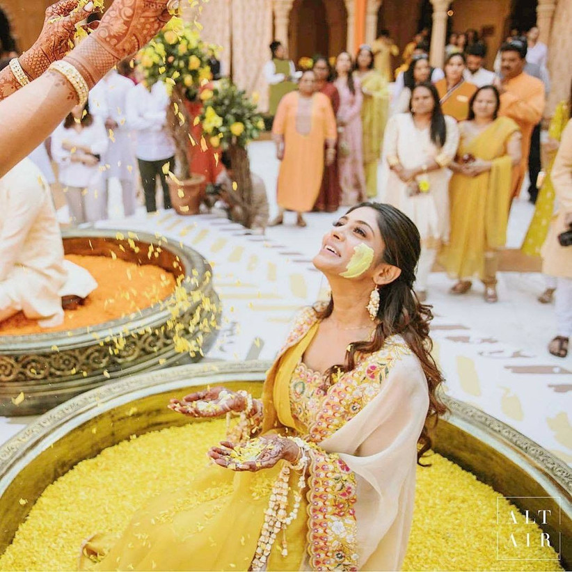 Haldi Ceremony The Perfect Blend Of Tradition And Fun Essentially a ceremony that involves putting haldi/turmeric paste on the dulha & dulhan, it's a custom held to ward off evil while. haldi ceremony the perfect blend of