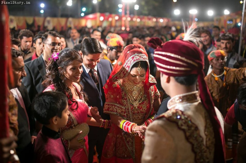 Welcoming the bride to her new home is a ritual called Grihapravesh.