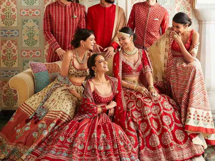 wedding suit and lehenga