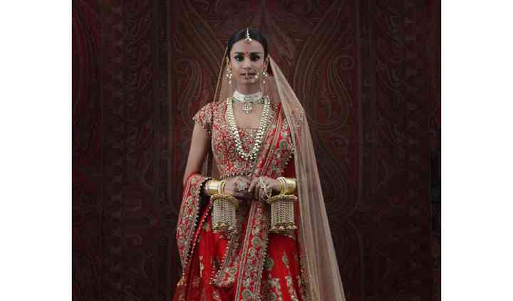 rimple and harpreet narula bridal lehenga cost