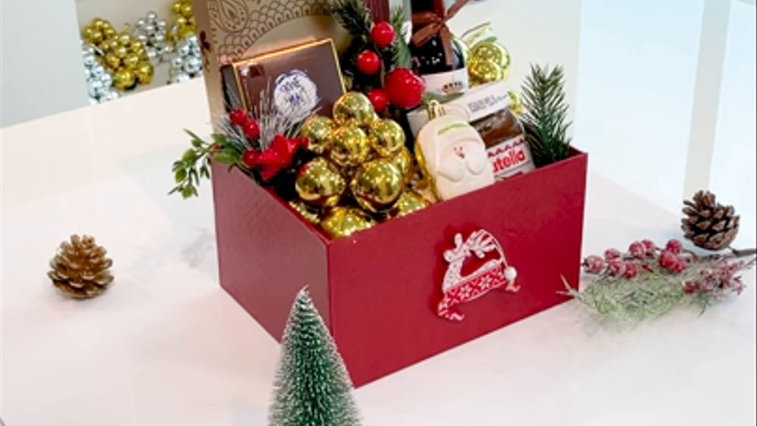 Elegantly Wrapped Christmas Hampers Full of Chocolates, Wine And More 