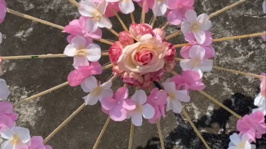 Floral umbrella for bridal entry 