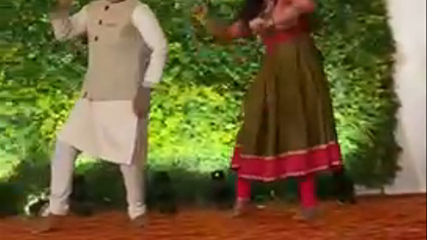 Couple dance for their cousin’s wedding