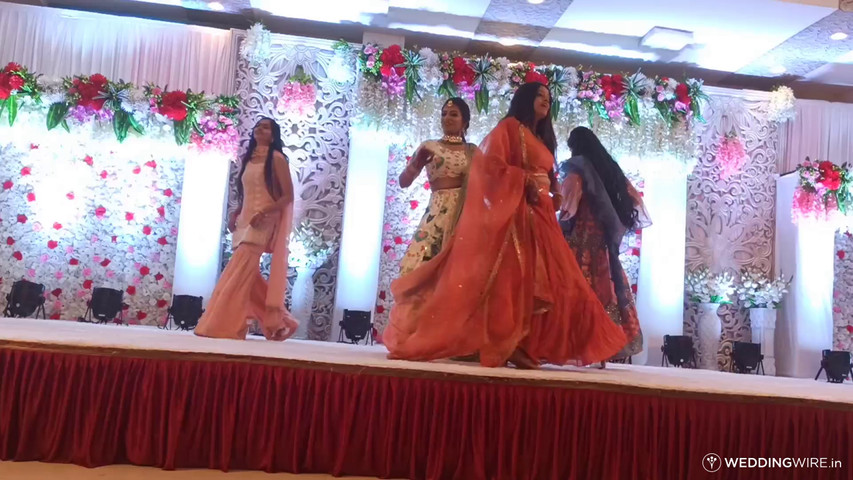 Bride with sisters dance 