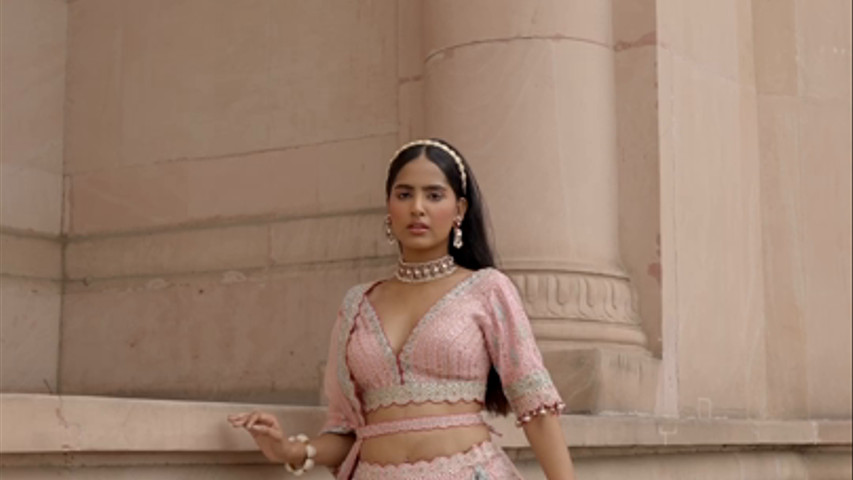 PEACH TAFETTA LEHENGA CHOLI WITH A WORKED BELT AND TULLE DUPATTA