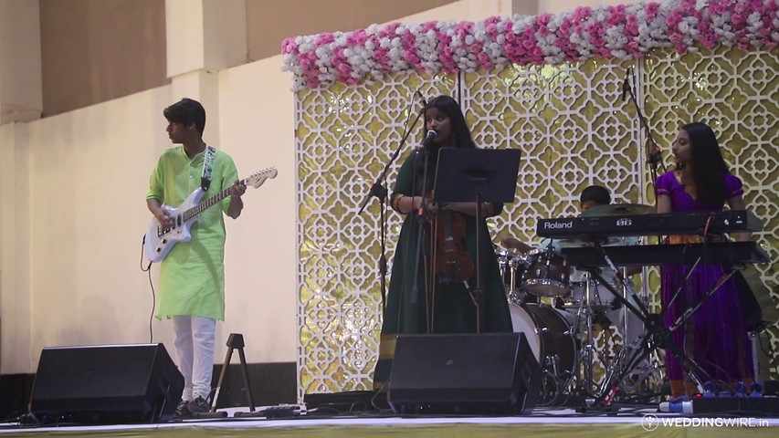 V4 music band performing live a Telugu Reception Event