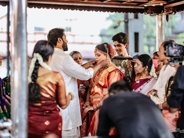ASHOK and CHANDHNI&apos;s wedding in Ernakulam, Kerala 13