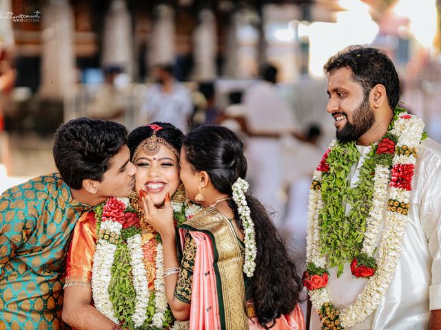 ASHOK and CHANDHNI&apos;s wedding in Ernakulam, Kerala 17