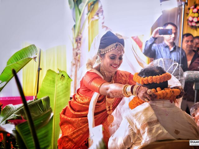 Mandipan and Lipika&apos;s wedding in Nagaon, Assam 54