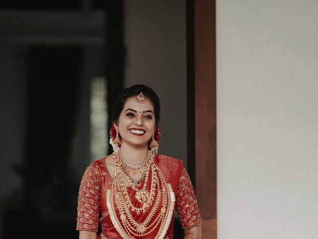 Sarath Keerthana and yswphoto&apos;s wedding in Ernakulam, Kerala 34