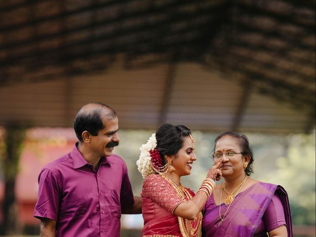 Sarath Keerthana and yswphoto&apos;s wedding in Ernakulam, Kerala 42