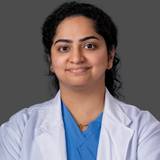 Dr.