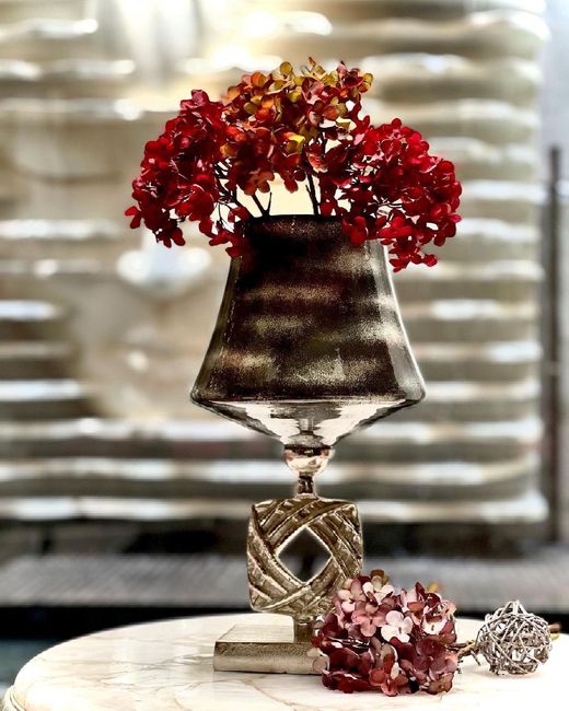 How about giving this silver vase as a return gift to the guests? - 1