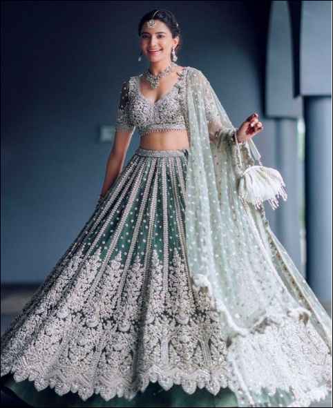 This dage green lehenga looks so alluring! - 1