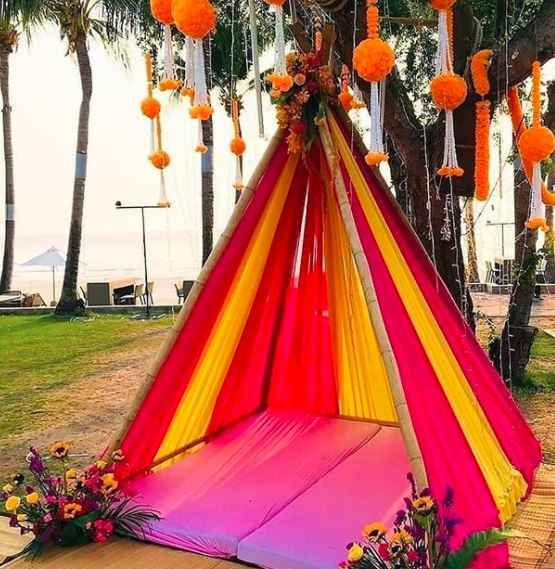 Colourful tent thats perfect for a haldi function decor! - 1