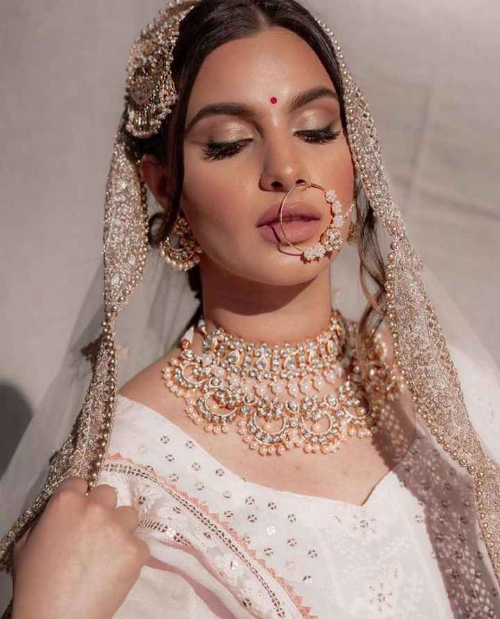 There is something so Angelic about Indian brides in white. - 2