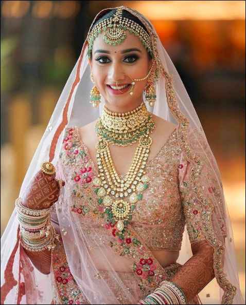 Pastel lehenga and Polki jewels can never go wrong! - 1