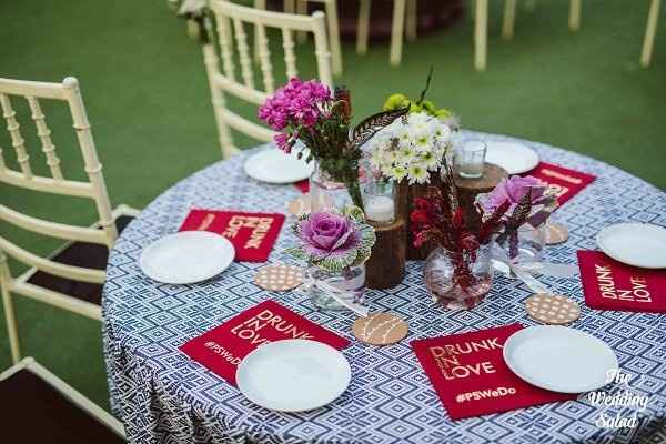 I love the idea of having a ciustomised tbale runner. your guests can even taken it home as a token 