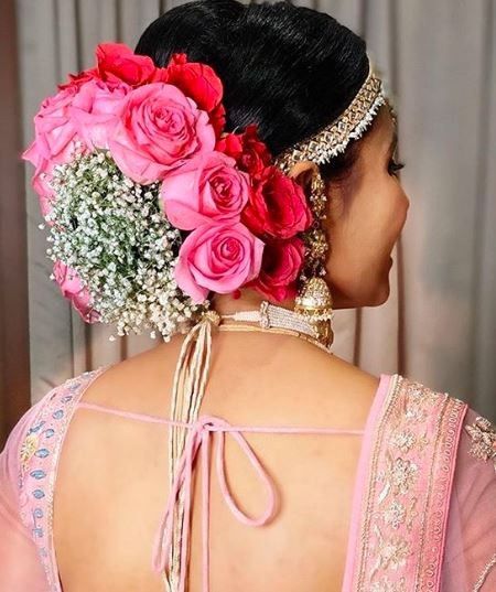 Look at these White vine kinda thing that's adding beauty to these floral buns - 1