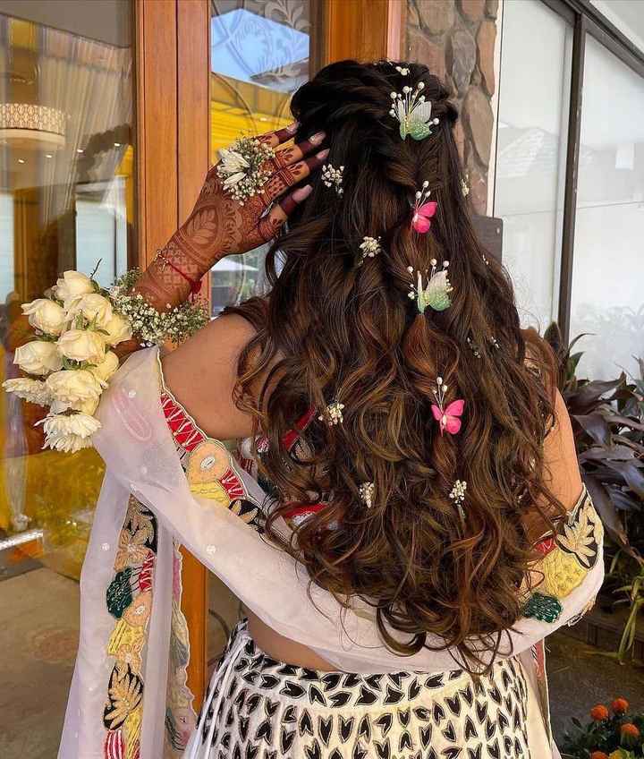 This hairdo looks so pretty! - 1