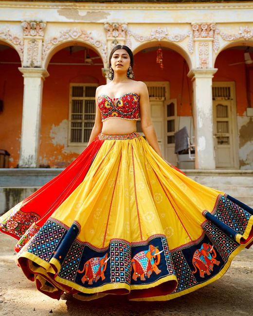 How do you like this multi-hued lehenga topped with a corset blouse? 😍 1