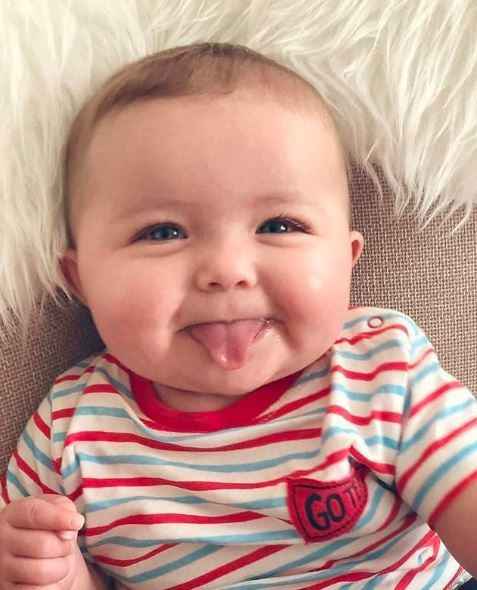 This Awwwwdorable baby reminds you of which emoji? - 1