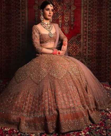 i cannot fathom the fact that how gorgeous is this Peach n onion Shade Wedding Lehenga - 1