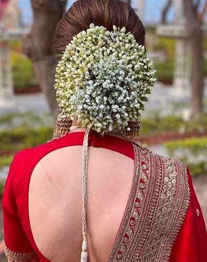 Backless blouse and big flower buns has a separate divinity about them! - 1