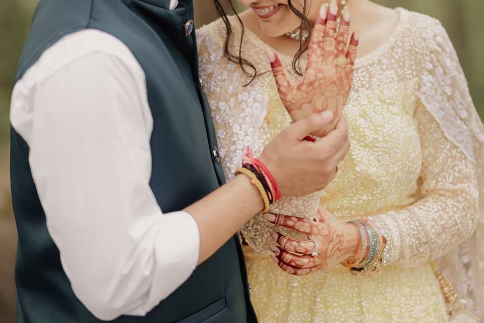 Intimate smiles and mehndi