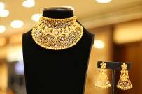 Gold necklace and earrings