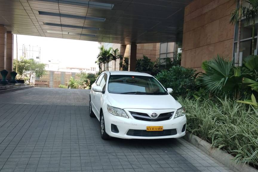 Corolla Altis Car hire in Bang