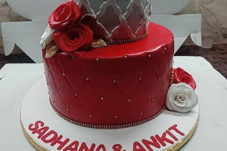 Red and white engagement cake