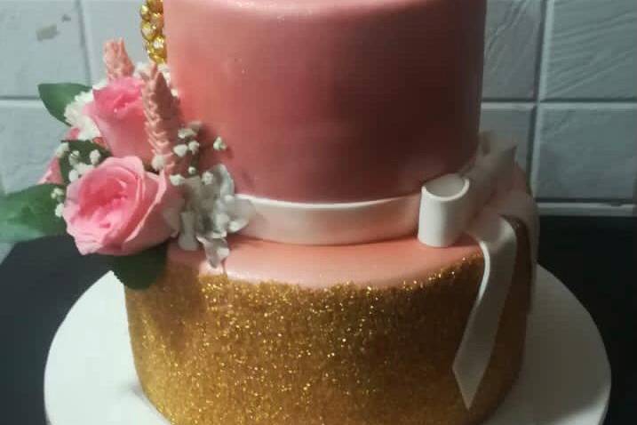 Gold and pink engagement cake