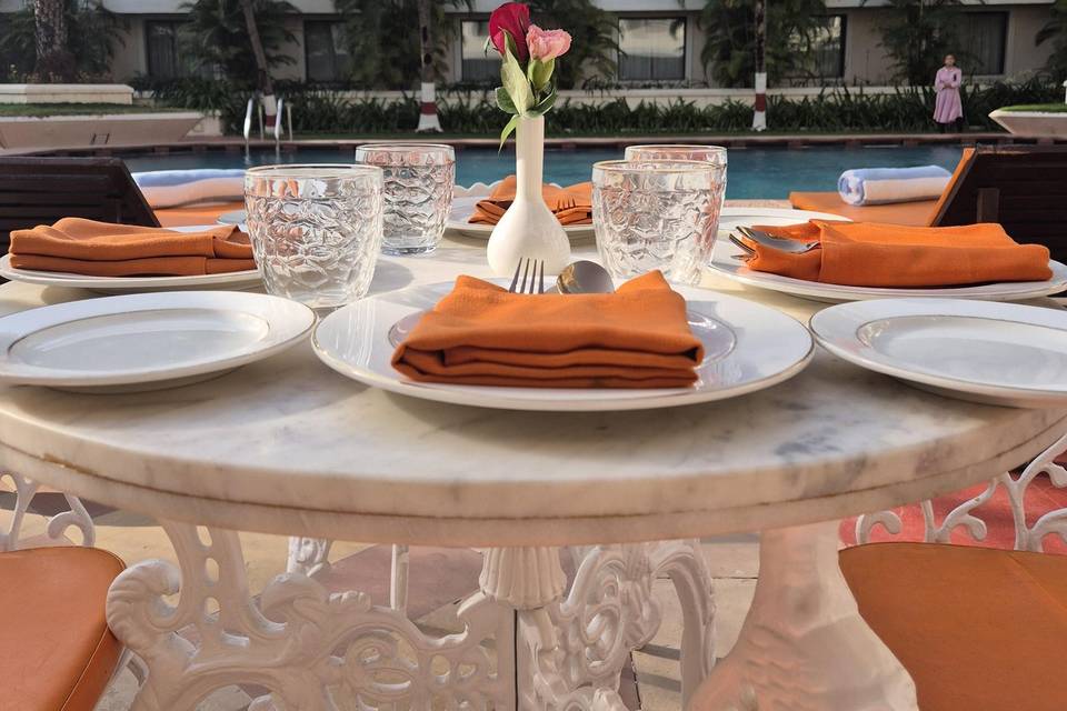 Couple meal by the poolside