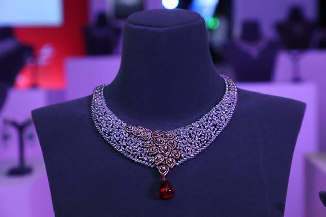 Tanishq ruby hot sale necklace sets