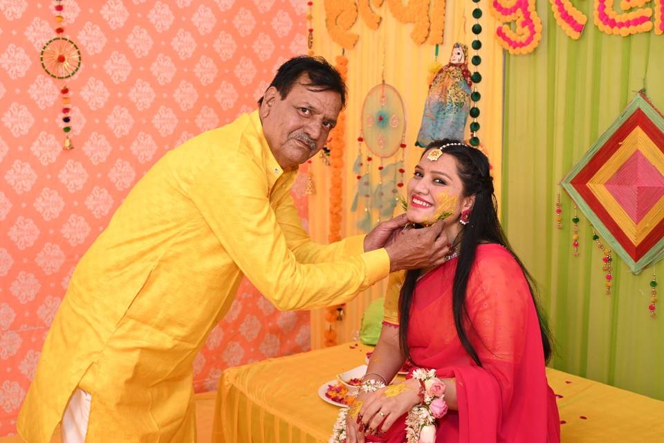 Haldi bride with her father