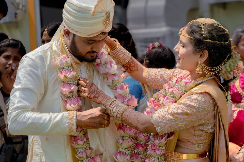 Tying love, dress and garland