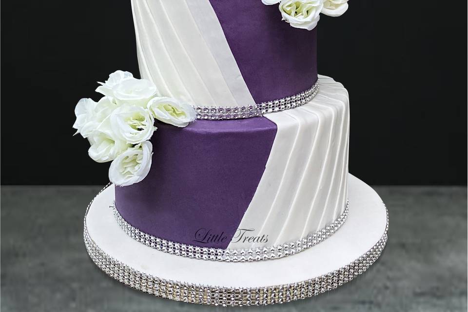 White drapes engagement cake