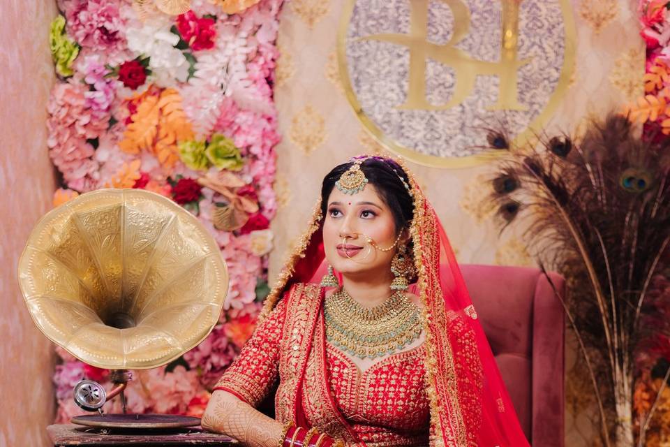 Bride posing with gramophone -