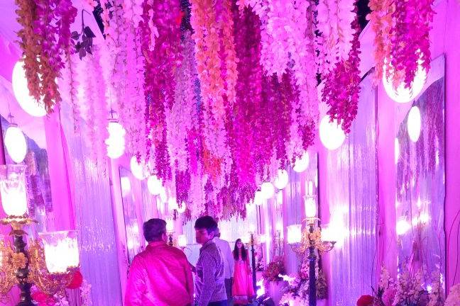 Entrance with hanging orchids