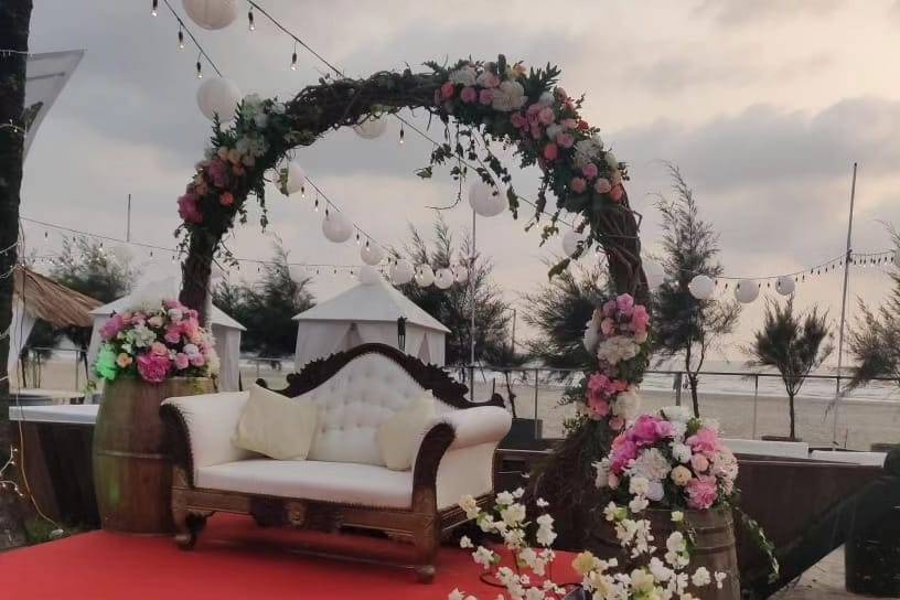 Couple sitting with backdrop