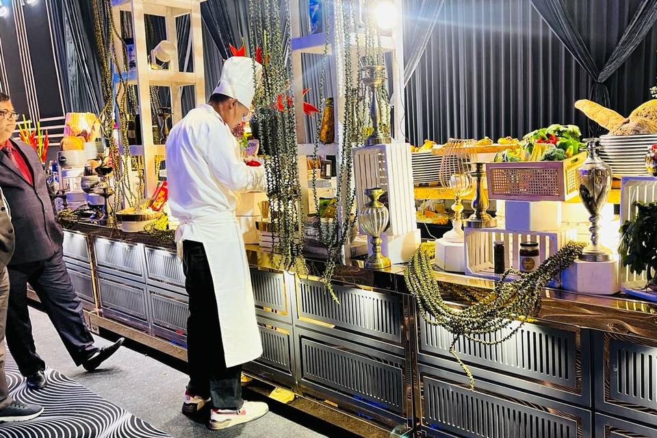 Chef arrangements food counter