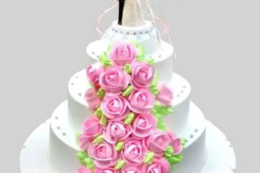 Monginis Cake Shop - Thane - This is a 3-tier Fruit Wedding cake designed  exclusively for occasions like weddings or anniversaries. It contains  flamboyant decoration of handcrafted marzipan fruits and flowers, dark