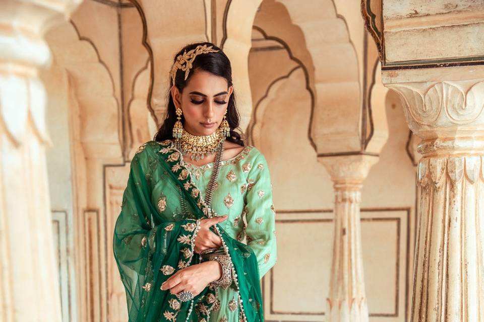 Green zardozi mukaish lehenga