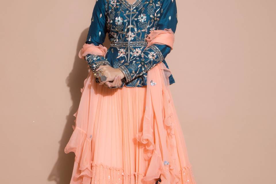 Peach lehenga with teal blue p