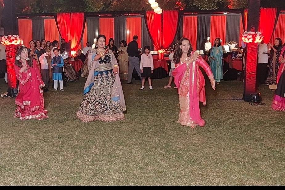 Bride performing with cousins