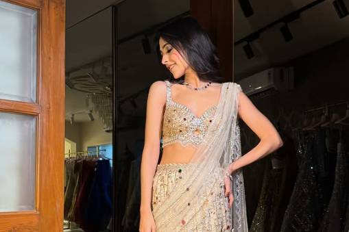 Cream color embroidered saree