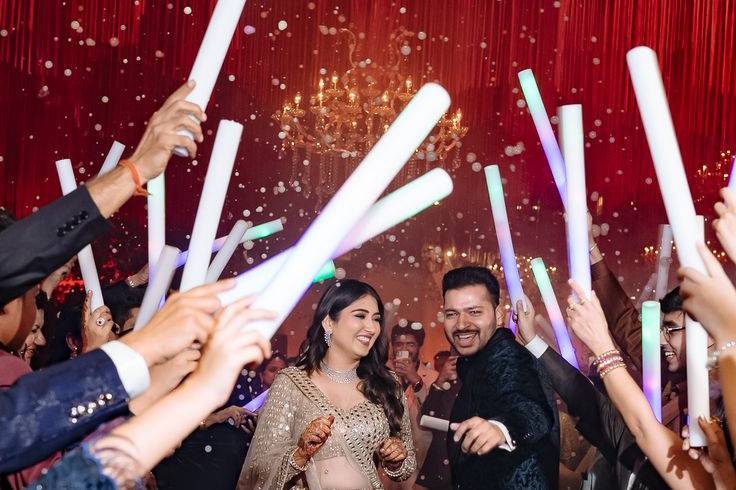 Couple entry with dandiya